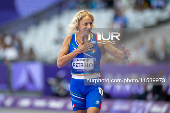 Valentina Petrillo of Team Italy warms up before competing in the Women's 400m T12 Heat 4 at Stade de France during the Paris 2024 Paralympi...