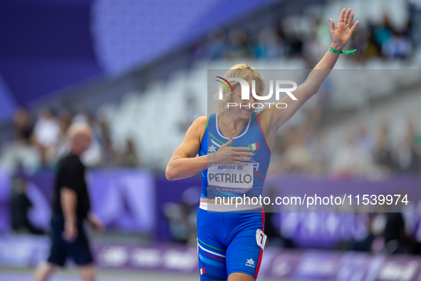 Valentina Petrillo of Team Italy reacts after qualifying for the finals in the Women's 400m T12 Heat 4 at Stade de France during the Paris 2...