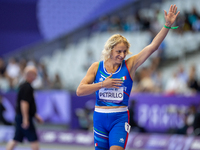 Valentina Petrillo of Team Italy reacts after qualifying for the finals in the Women's 400m T12 Heat 4 at Stade de France during the Paris 2...