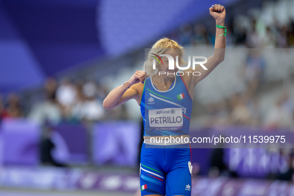 Valentina Petrillo of Team Italy reacts after qualifying for the finals in the Women's 400m T12 Heat 4 at Stade de France during the Paris 2...