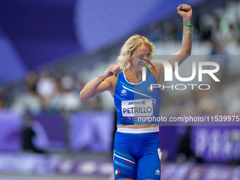 Valentina Petrillo of Team Italy reacts after qualifying for the finals in the Women's 400m T12 Heat 4 at Stade de France during the Paris 2...