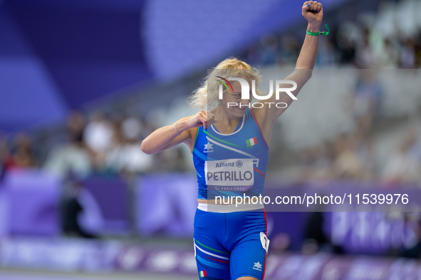 Valentina Petrillo of Team Italy reacts after qualifying for the finals in the Women's 400m T12 Heat 4 at Stade de France during the Paris 2...