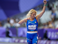 Valentina Petrillo of Team Italy reacts after qualifying for the finals in the Women's 400m T12 Heat 4 at Stade de France during the Paris 2...