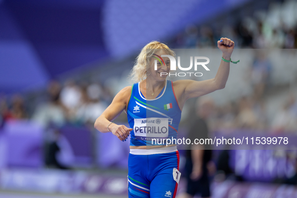 Valentina Petrillo of Team Italy reacts after qualifying for the finals in the Women's 400m T12 Heat 4 at Stade de France during the Paris 2...