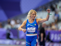 Valentina Petrillo of Team Italy reacts after qualifying for the finals in the Women's 400m T12 Heat 4 at Stade de France during the Paris 2...