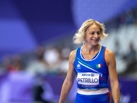 Valentina Petrillo of Team Italy warms up before competing in the Women's 400m T12 Heat 4 at Stade de France during the Paris 2024 Paralympi...