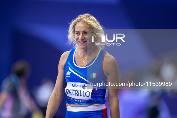 Valentina Petrillo of Team Italy warms up before competing in the Women's 400m T12 Heat 4 at Stade de France during the Paris 2024 Paralympi...