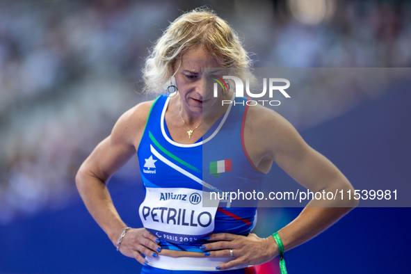 Valentina Petrillo of Team Italy warms up before competing in the Women's 400m T12 Heat 4 at Stade de France during the Paris 2024 Paralympi...