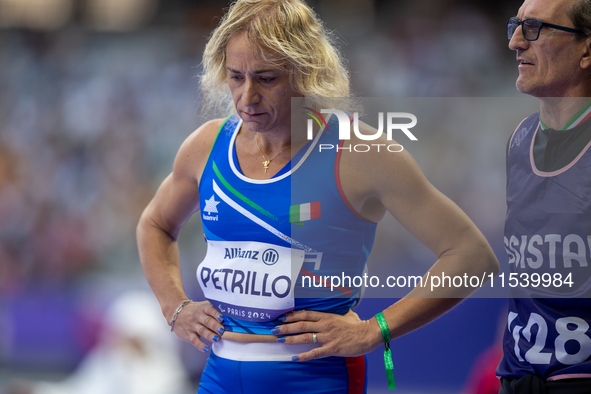 Valentina Petrillo of Team Italy warms up before competing in the Women's 400m T12 Heat 4 at Stade de France during the Paris 2024 Paralympi...