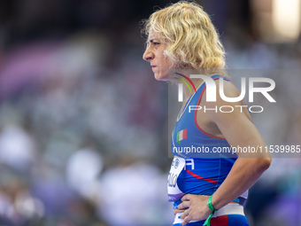 Valentina Petrillo of Team Italy warms up before competing in the Women's 400m T12 Heat 4 at Stade de France during the Paris 2024 Paralympi...