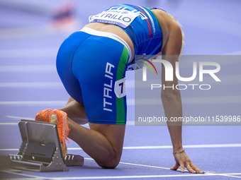 Valentina Petrillo of Team Italy warms up before competing in the Women's 400m T12 Heat 4 at Stade de France during the Paris 2024 Paralympi...