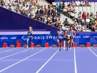 Valentina Petrillo of Team Italy competes in the Women's 400m T12 Heat 4 at Stade de France during the Paris 2024 Paralympic Games in Paris,...