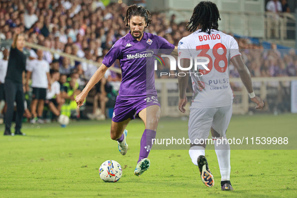 Yacine Adli of ACF Fiorentina controls the ball during the Italian Serie A football match between ACF Fiorentina and A.C. Monza in Florence,...