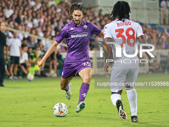 Yacine Adli of ACF Fiorentina controls the ball during the Italian Serie A football match between ACF Fiorentina and A.C. Monza in Florence,...