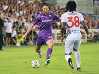 Yacine Adli of ACF Fiorentina controls the ball during the Italian Serie A football match between ACF Fiorentina and A.C. Monza in Florence,...