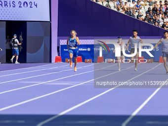 Valentina Petrillo of Team Italy competes in the Women's 400m T12 Heat 4 at Stade de France during the Paris 2024 Paralympic Games in Paris,...