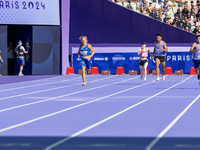 Valentina Petrillo of Team Italy competes in the Women's 400m T12 Heat 4 at Stade de France during the Paris 2024 Paralympic Games in Paris,...