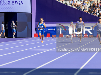 Valentina Petrillo of Team Italy competes in the Women's 400m T12 Heat 4 at Stade de France during the Paris 2024 Paralympic Games in Paris,...