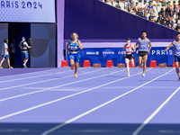 Valentina Petrillo of Team Italy competes in the Women's 400m T12 Heat 4 at Stade de France during the Paris 2024 Paralympic Games in Paris,...