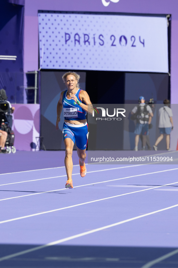 Valentina Petrillo of Team Italy competes in the Women's 400m T12 Heat 4 at Stade de France during the Paris 2024 Paralympic Games in Paris,...