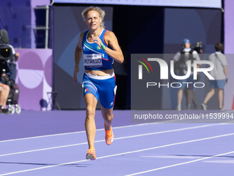 Valentina Petrillo of Team Italy competes in the Women's 400m T12 Heat 4 at Stade de France during the Paris 2024 Paralympic Games in Paris,...