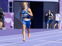 Valentina Petrillo of Team Italy competes in the Women's 400m T12 Heat 4 at Stade de France during the Paris 2024 Paralympic Games in Paris,...