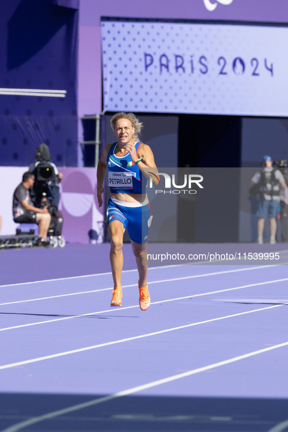 Valentina Petrillo of Team Italy competes in the Women's 400m T12 Heat 4 at Stade de France during the Paris 2024 Paralympic Games in Paris,...