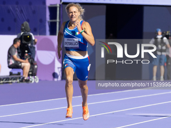 Valentina Petrillo of Team Italy competes in the Women's 400m T12 Heat 4 at Stade de France during the Paris 2024 Paralympic Games in Paris,...