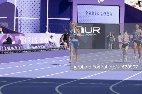 Valentina Petrillo of Team Italy competes in the Women's 400m T12 Heat 4 at Stade de France during the Paris 2024 Paralympic Games in Paris,...