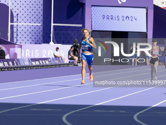 Valentina Petrillo of Team Italy competes in the Women's 400m T12 Heat 4 at Stade de France during the Paris 2024 Paralympic Games in Paris,...