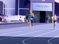 Valentina Petrillo of Team Italy competes in the Women's 400m T12 Heat 4 at Stade de France during the Paris 2024 Paralympic Games in Paris,...