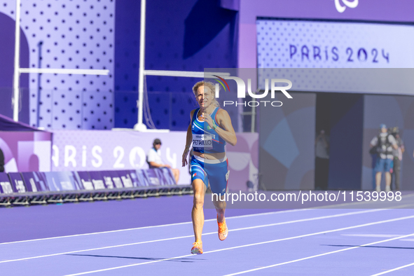 Valentina Petrillo of Team Italy competes in the Women's 400m T12 Heat 4 at Stade de France during the Paris 2024 Paralympic Games in Paris,...