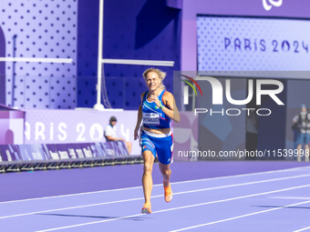 Valentina Petrillo of Team Italy competes in the Women's 400m T12 Heat 4 at Stade de France during the Paris 2024 Paralympic Games in Paris,...