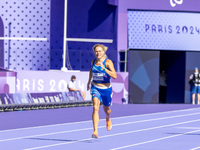 Valentina Petrillo of Team Italy competes in the Women's 400m T12 Heat 4 at Stade de France during the Paris 2024 Paralympic Games in Paris,...