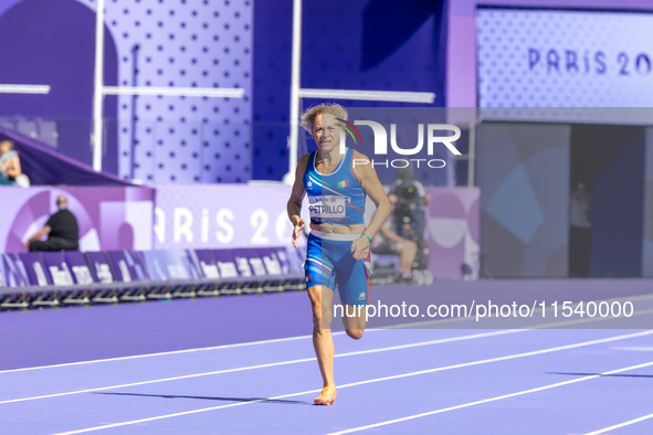 Valentina Petrillo of Team Italy competes in the Women's 400m T12 Heat 4 at Stade de France during the Paris 2024 Paralympic Games in Paris,...