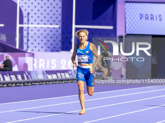 Valentina Petrillo of Team Italy competes in the Women's 400m T12 Heat 4 at Stade de France during the Paris 2024 Paralympic Games in Paris,...