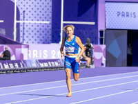 Valentina Petrillo of Team Italy competes in the Women's 400m T12 Heat 4 at Stade de France during the Paris 2024 Paralympic Games in Paris,...