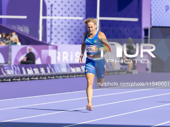 Valentina Petrillo of Team Italy competes in the Women's 400m T12 Heat 4 at Stade de France during the Paris 2024 Paralympic Games in Paris,...