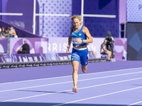 Valentina Petrillo of Team Italy competes in the Women's 400m T12 Heat 4 at Stade de France during the Paris 2024 Paralympic Games in Paris,...