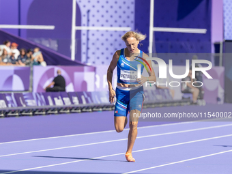 Valentina Petrillo of Team Italy competes in the Women's 400m T12 Heat 4 at Stade de France during the Paris 2024 Paralympic Games in Paris,...