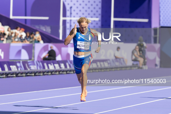 Valentina Petrillo of Team Italy competes in the Women's 400m T12 Heat 4 at Stade de France during the Paris 2024 Paralympic Games in Paris,...