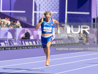 Valentina Petrillo of Team Italy competes in the Women's 400m T12 Heat 4 at Stade de France during the Paris 2024 Paralympic Games in Paris,...