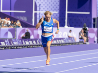 Valentina Petrillo of Team Italy competes in the Women's 400m T12 Heat 4 at Stade de France during the Paris 2024 Paralympic Games in Paris,...