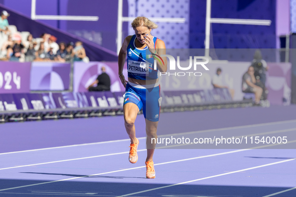 Valentina Petrillo of Team Italy competes in the Women's 400m T12 Heat 4 at Stade de France during the Paris 2024 Paralympic Games in Paris,...