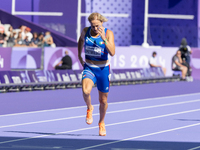 Valentina Petrillo of Team Italy competes in the Women's 400m T12 Heat 4 at Stade de France during the Paris 2024 Paralympic Games in Paris,...