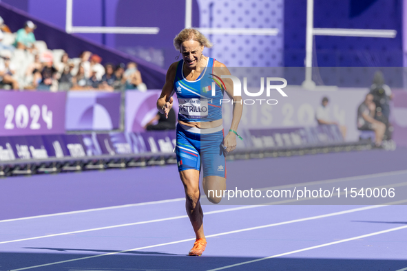 Valentina Petrillo of Team Italy competes in the Women's 400m T12 Heat 4 at Stade de France during the Paris 2024 Paralympic Games in Paris,...