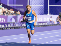 Valentina Petrillo of Team Italy competes in the Women's 400m T12 Heat 4 at Stade de France during the Paris 2024 Paralympic Games in Paris,...