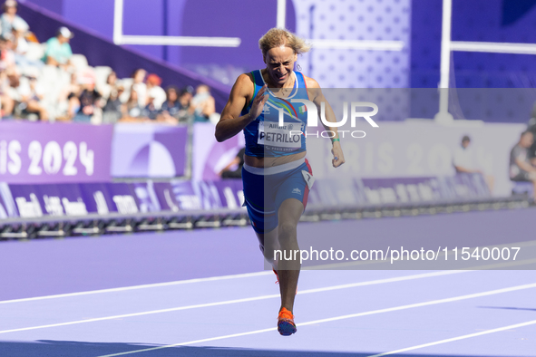 Valentina Petrillo of Team Italy competes in the Women's 400m T12 Heat 4 at Stade de France during the Paris 2024 Paralympic Games in Paris,...