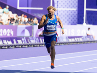 Valentina Petrillo of Team Italy competes in the Women's 400m T12 Heat 4 at Stade de France during the Paris 2024 Paralympic Games in Paris,...