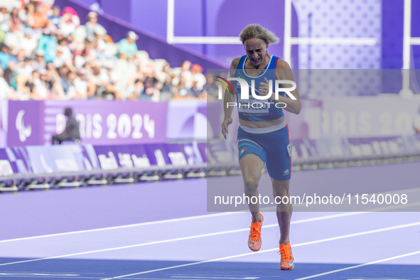 Valentina Petrillo of Team Italy competes in the Women's 400m T12 Heat 4 at Stade de France during the Paris 2024 Paralympic Games in Paris,...